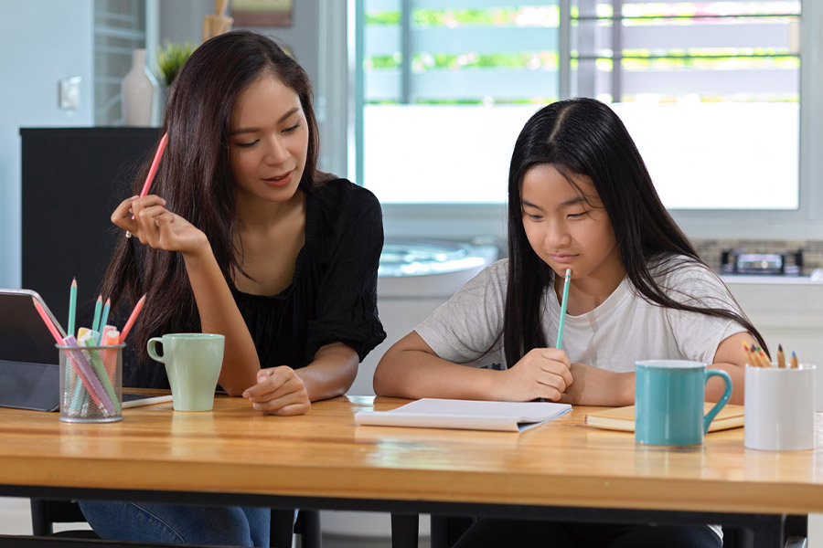 student and tutor together at a desk in Alpharetta